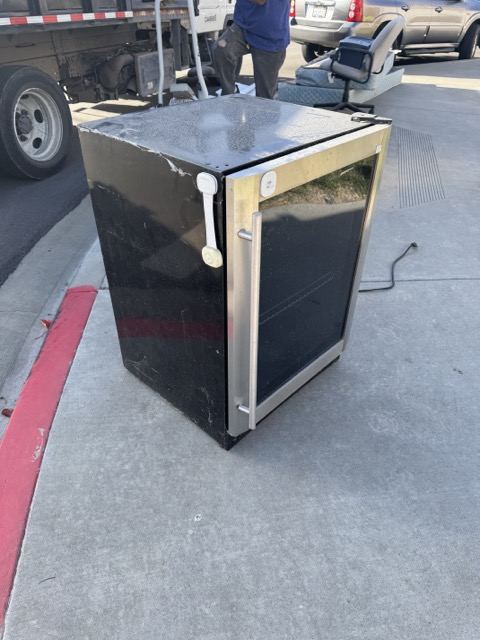 Undercounter wine refrigerator staged for San Diego appliance removal
