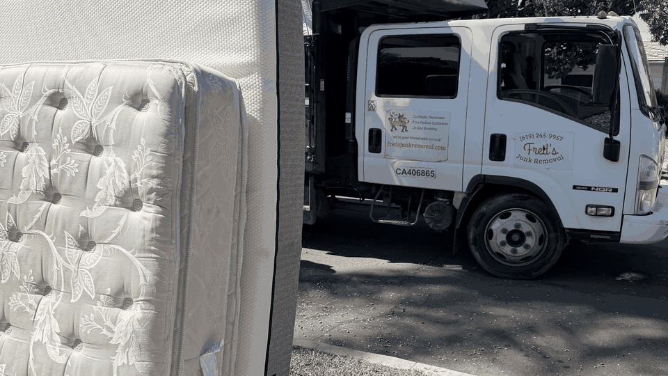 Curbside mattress removal in North Park, San Diego. Fred's crew loads two mattresses from the curb into the Isuzu dump truck.